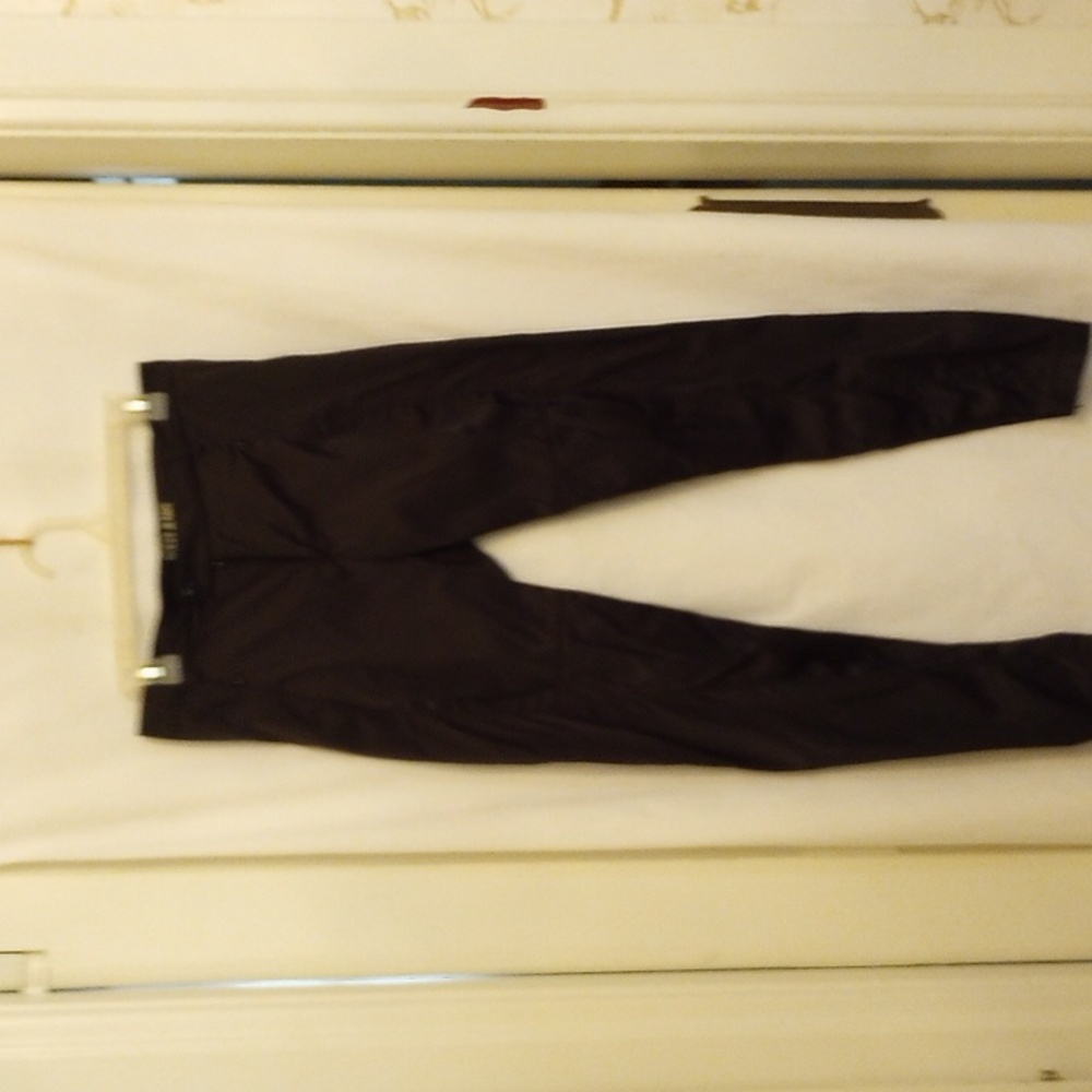 Guess Jeans, black satiny, some stretch, waist 30in, very cool.